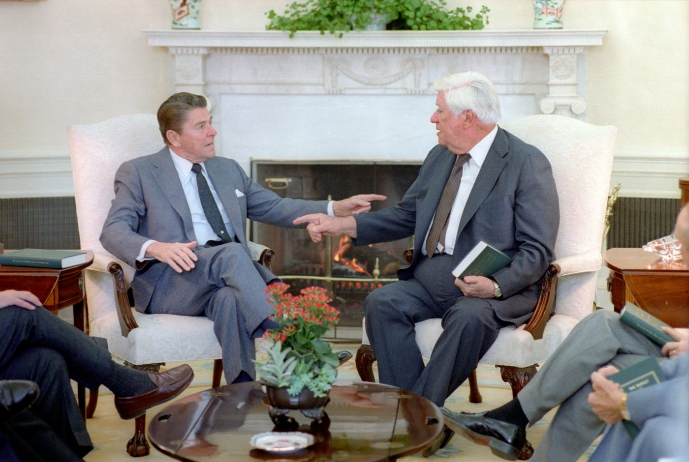President Reagan and House Speaker Tip O’Neill talking in the Oval Office